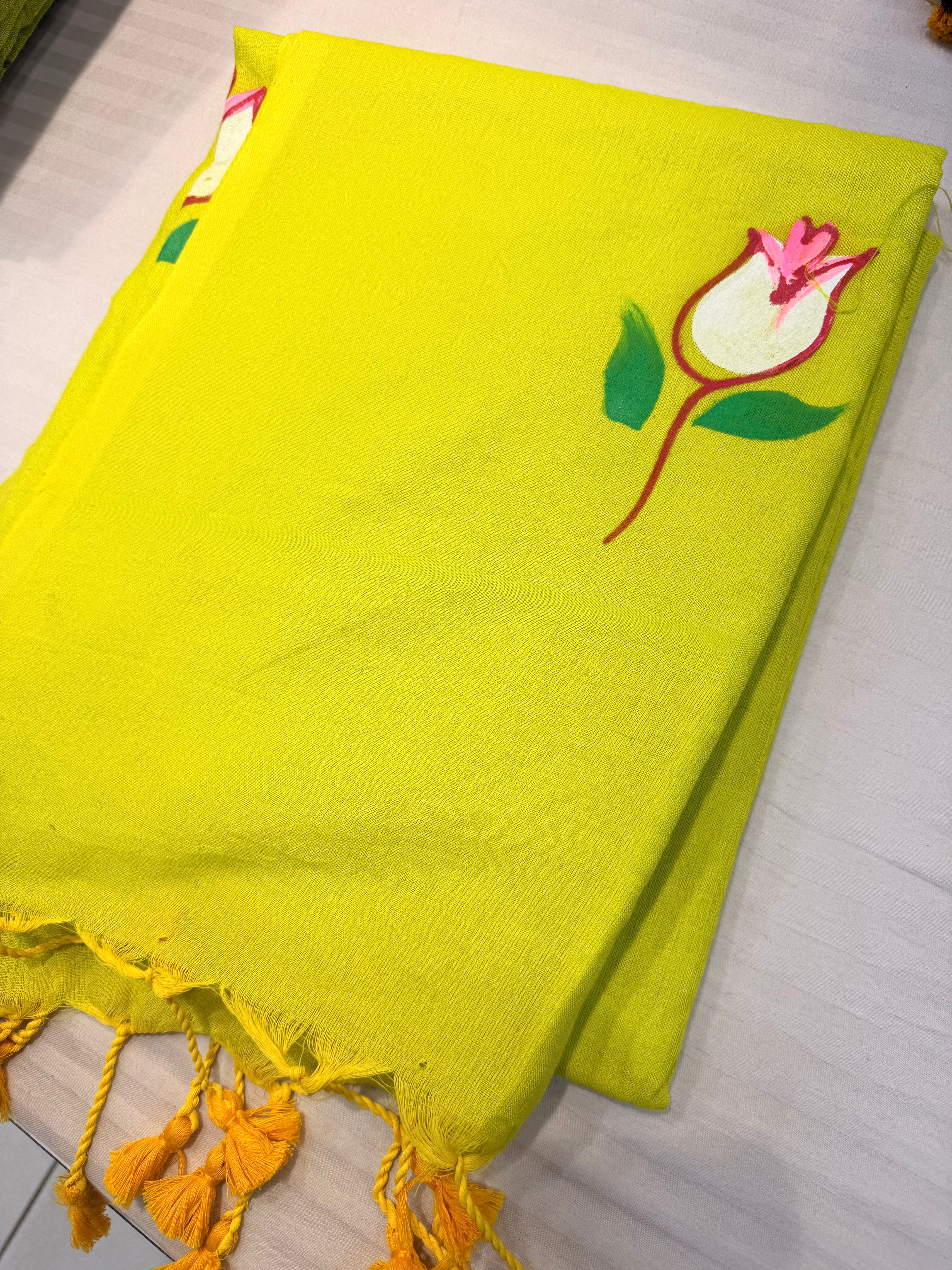 Graceful Pistachio Green Floral Cotton Saree with Tassel Detailing